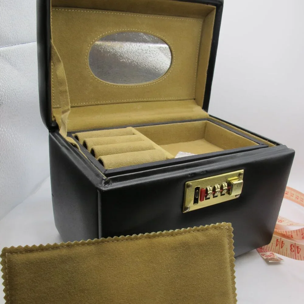 Leather black locking jewelry case with ring form and 2 additional drawers